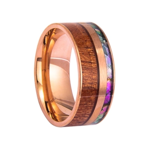 Rose gold titanium ring with walnut wood and iridescent shell inlay on white background