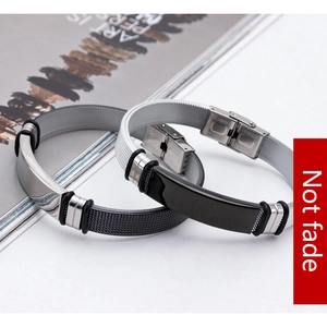 Detail of adjustable stainless steel mesh bracelets in silver and black with folding clasp