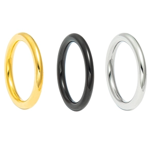 Minimalist stackable titanium steel round rings in polished gold, black, and silver finishes