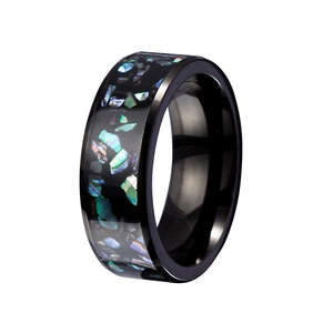 Close-up of 8mm black titanium steel ring with colorful opal inlay and galaxy design