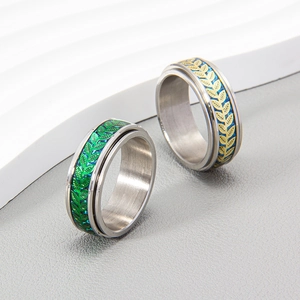 Spinner leaf texture titanium steel ring with carbon fiber patch in blue and gold finish