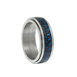Close-up of rotatable stainless steel ring featuring blue leaf carbon fiber texture inlay