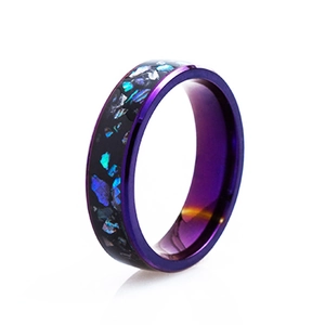 Macro detail of purple galaxy titanium steel ring with iridescent inlaid shell