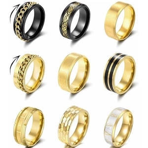 Detail view of nine stainless steel fidget rings with celtic knots and roman numerals