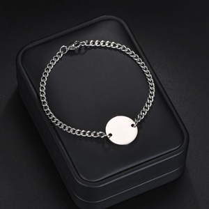 Bracelet à maillons en acier inoxydable argenté avec pendentif rond sur boîte noire