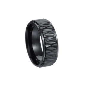 Detail of men's black stainless steel ring featuring 3D geometric engraved textures