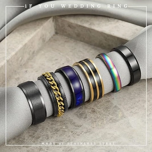 6-piece set of men's stainless steel rings in matte black, gold, and cosmic designs