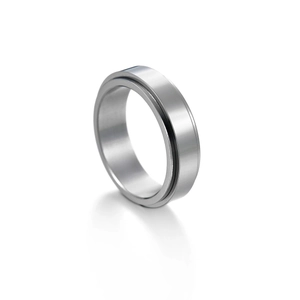 Macro detail of 6mm silver spinner ring featuring polished stainless steel finish
