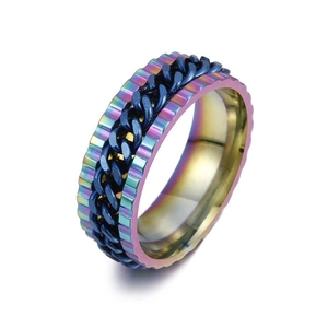 Detail view of rotating rainbow steel ring featuring a movable blue chain and gear edges