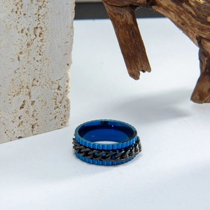 Industrial rotating gear ring with black chain inlay on blue stainless steel band