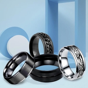 Men's 4-piece titanium steel ring set including black brushed and Celtic knot designs