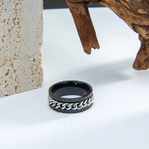 Macro shot of punk industrial rotatable chain ring with mechanical gear edges