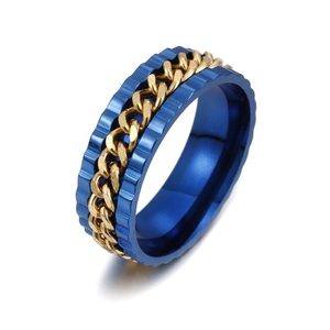 Detailed macro view of rotatable gear ring with blue finish and golden Cuban link