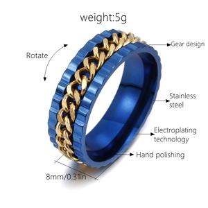 Close-up of rotatable 8mm stainless steel ring with blue gears and gold chain inlay