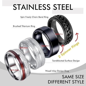 Set of four 8mm stainless steel rings for men featuring wood inlay and spinner designs