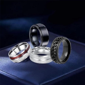 Set of four men's vintage matte ice silk rings with black and silver industrial finishes