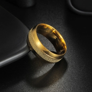 Minimalist 8mm gold stainless steel ring featuring dual polished and frosted textures
