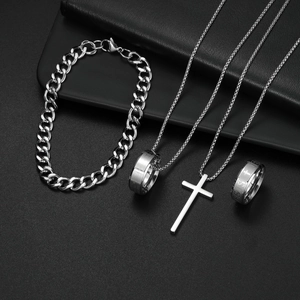 Silver cross jewelry set including Jesus ring, Cuban bracelet, and pendant necklace