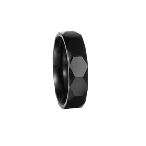 Detail of men's black honeycomb pattern wedding band with matte geometric facets