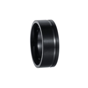 Detail of black titanium steel ring with matte brushed finish and polished groove line