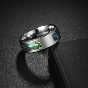 Men's titanium steel ring with abalone shell inlay on a premium black background