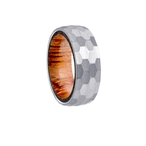 Macro detail of 8mm hammered titanium ring with natural rosewood inner lining