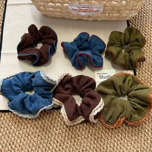 Chic autumn fabric scrunchie set in brown and blue with elegant crochet lace edging details