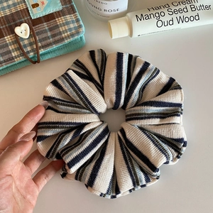 Vintage college style knitted oversized scrunchie with classic blue stripes on white