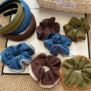 Mixed color thick headbands and scrunchies set in green, blue, and brown fabric