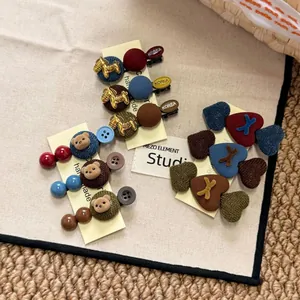 Handmade Korean style vintage hair clips with heart and horse icons on cards