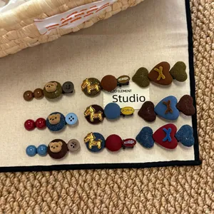 Nine-piece Korean hair clip set with velvet bears, metal ponies, and heart patterns