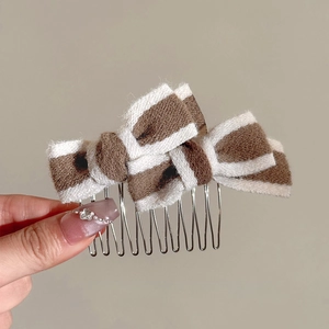 Vintage plush bow hair comb with brown striped pattern and silver anti-slip metal teeth