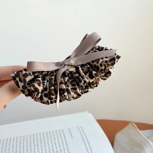 Leopard print banana hair clip with grey satin bow and gold Luna charm for high ponytail