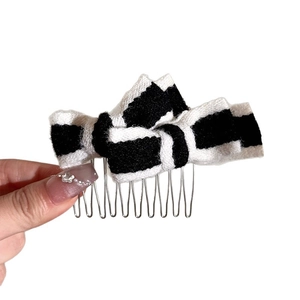 Vintage checkered plush bow hair comb with silver metal teeth for elegant hairstyling