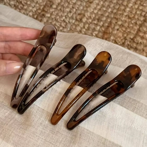 Set of 4 elegant amber tortoiseshell duckbill hair clips for women with non-slip design
