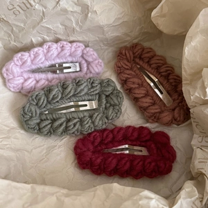 Set of four handmade knitted wave-edge hair clips in soft candy colors with metal BB base