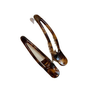 Elegant tortoiseshell duckbill hair clips with a high-gloss finish and metal spring grip