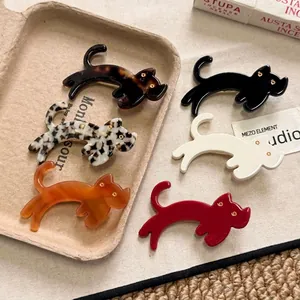 Barrettes chat en acétate chic en six couleurs assorties dont écaille et blanc ivoire