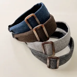 Minimalist wide fabric headbands in four colors with amber buckle and herringbone pattern