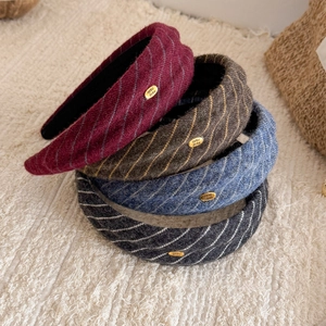 Retro striped wide headband set in burgundy, grey, and blue with handmade metal tag