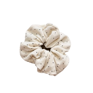 Vintage soft knit polka dot scrunchie in cream and black for elegant ponytails