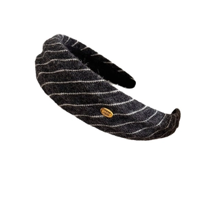 Retro striped wide headband in dark grey fabric with a handmade gold metal tag