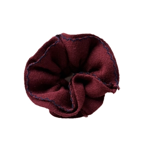 Burgundy knitted scrunchie with blue wavy edges for elegant ponytail hairstyles