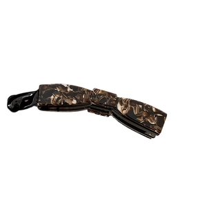 Banana hair clip with tortoiseshell marble pattern for elegant high ponytail hairstyles