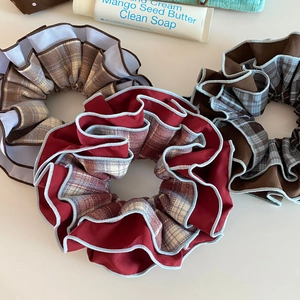 Three vintage plaid scrunchies in red, coffee, and blue grey on white background