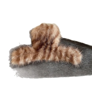 Brown striped plush hair claw clip with faux fur texture for autumn and winter hairstyles