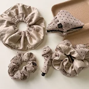 Elegant beige polka dot hair clip and silk scrunchie set for Korean style updos