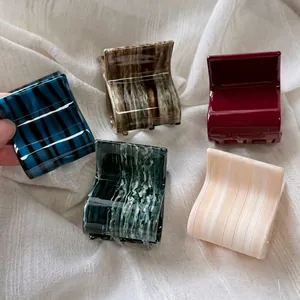 French style acetate claw clips in five patterns including marble and tortoiseshell
