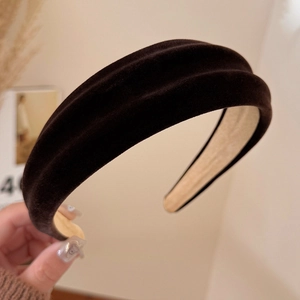 Close-up of velvet wide headband showing soft texture and non-slip inner lining