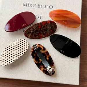 Elegant oval marble pattern acetate hair barrettes in various stylish textures and colors